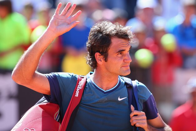 ROME, ITALY - MAY 14:  Roger Federer of Switzerland waves to the crowd after losing to Jeremy Chardy of France during day four of the Internazionali BNL d'Italia tennis 2014 on May 14, 2014 in Rome, Italy.  (Photo by Julian Finney/Getty Images)
