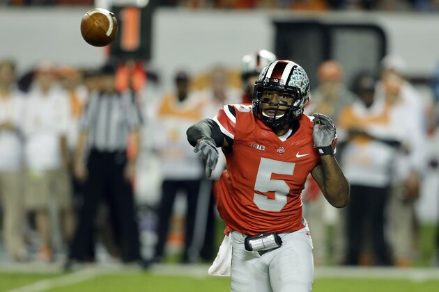 Ohio State Buckeyes quarterback Braxton Miller (5) passes the football during the first half of the Orange Bowl NCAA college football game against Clemson, Friday, Jan. 3, 2014, in Miami Gardens, Fla. (AP Photo/Wilfredo Lee)