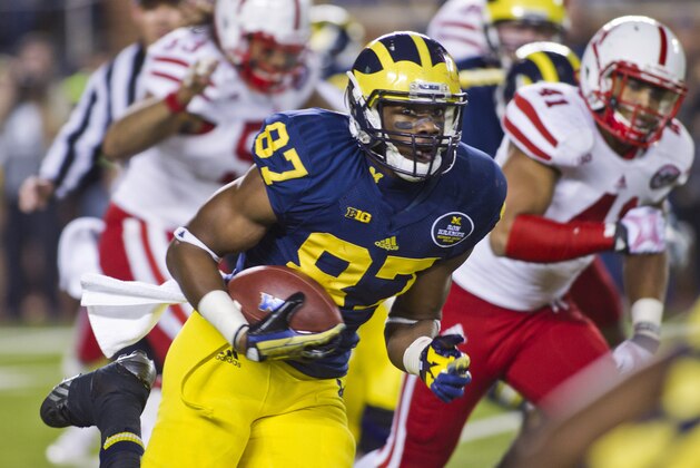 Michigan tight end Devin Funchess (87) runs with a pass reception during the third quarter of an NCAA college football game against Nebraska in Ann Arbor, Mich., Saturday, Nov. 9, 2013. Nebraska won 17-13. (AP Photo/Tony Ding)
