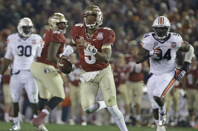 Florida State's Jameis Winston scrambles during the second half of the NCAA BCS National Championship college football game against Auburn Monday, Jan. 6, 2014, in Pasadena, Calif. (AP Photo/David J. Phillip)