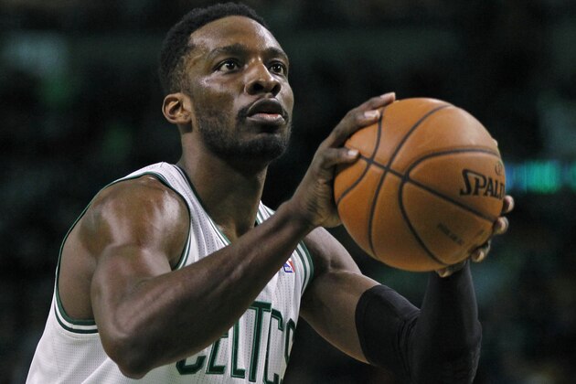 Boston Celtics forward Jeff Green (8) shoots a free throw during the second half of an NBA basketball game in Boston, Wednesday, April 16, 2014. (AP Photo/Elise Amendola)