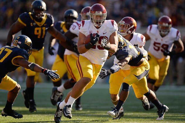 BERKELEY, CA - NOVEMBER 09:  Ty Isaac #29 of the USC Trojans carries the ball against the California Golden Bears during the third quarter at California Memorial Stadium on November 9, 2013 in Berkeley, California. The Trojans won the game 62-28. (Photo by Thearon W. Henderson/Getty Images)