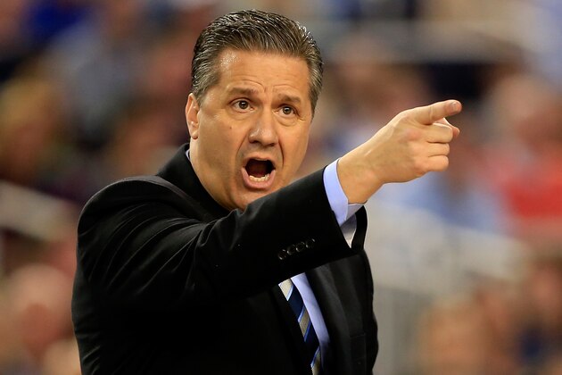 ARLINGTON, TX - APRIL 07:  Head coach John Calipari of the Kentucky Wildcats motions to his players during the NCAA Men's Final Four Championship against the Connecticut Huskies at AT&T Stadium on April 7, 2014 in Arlington, Texas.  (Photo by Jamie Squire/Getty Images)
