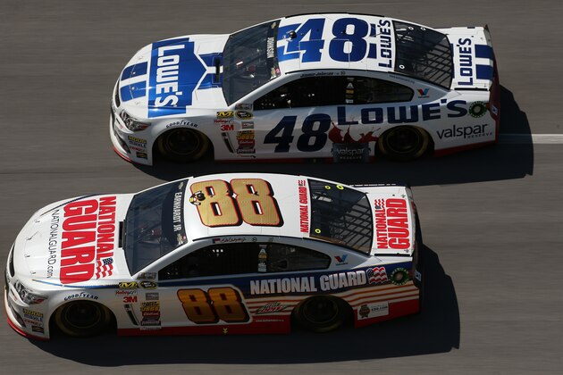 TALLADEGA, AL - MAY 04: Dale Earnhardt Jr., driver of the #88 National Guard Chevrolet, leads Jimmie Johnson, driver of the #48 Lowe's / Valspar Reserve Chevrolet, during the NASCAR Sprint Cup Series Aaron's 499 at Talladega Superspeedway on May 4, 2014 in Talladega, Alabama.  (Photo by Chris Graythen/Getty Images)