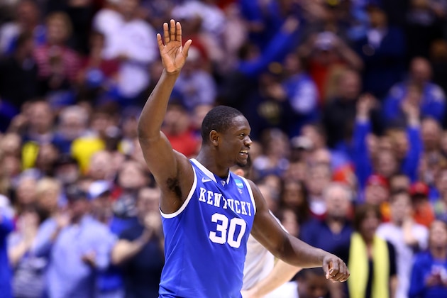 INDIANAPOLIS, IN - MARCH 28:  Julius Randle #30 of the Kentucky Wildcats celebrates defeating the Louisville Cardinals 74 to 69 during the regional semifinal of the 2014 NCAA Men's Basketball Tournament at Lucas Oil Stadium on March 28, 2014 in Indianapolis, Indiana.  (Photo by Andy Lyons/Getty Images)