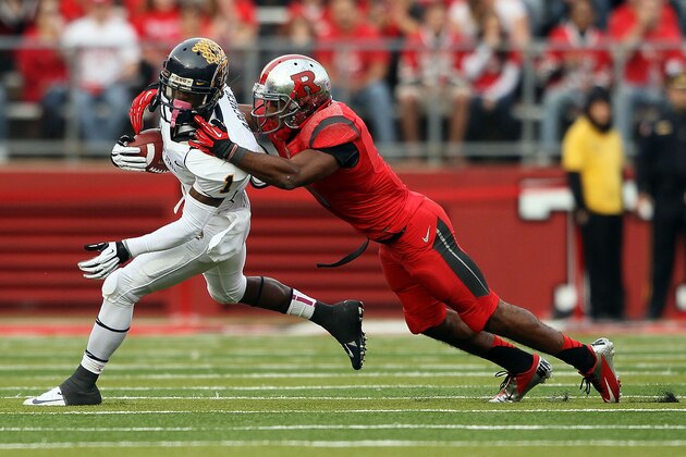 PISCATAWAY, NJ - OCTOBER 27: Logan Ryan #11 of the Rutgers Scarlet Knights tackles Dri Archer #1 of the Kent State Golden Flashes at High Point Solutions Stadium on October 27, 2012 in Piscataway, New Jersey. (Photo by Alex Trautwig/Getty Images)