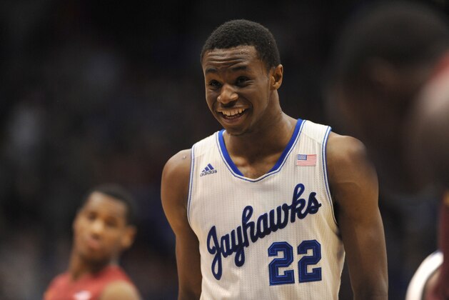 Jan 29, 2014; Lawrence, KS, USA; Kansas Jayhawks guard Andrew Wiggins (22) laughs before shooting a free throw during the second half against the Iowa State Cyclones at Allen Fieldhouse. Kansas won 92 - 81. Mandatory Credit: Denny Medley-USA TODAY Sports
