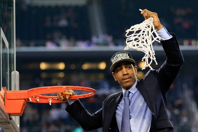 ARLINGTON, TX - APRIL 07:  Head coach Kevin Ollie of the Connecticut Huskies cuts down the net after defeating the Kentucky Wildcats 60-54 in the NCAA Men's Final Four Championship at AT&T Stadium on April 7, 2014 in Arlington, Texas.  (Photo by Jamie Squire/Getty Images)