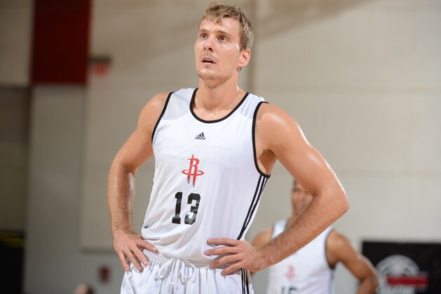 LAS VEGAS, NV - JULY 18: Zoran Dragic #13 of the Houston Rockets looks on during NBA Summer League on July 18, 2012 at Cox Pavilion in Las Vegas, Nevada. NOTE TO USER: User expressly acknowledges and agrees that, by downloading and/or using this Photograph, user is consenting to the terms and conditions of the Getty Images License Agreement. Mandatory Copyright Notice: Copyright 2012 NBAE (Photo by Garrett W. Ellwood/NBAE via Getty Images)