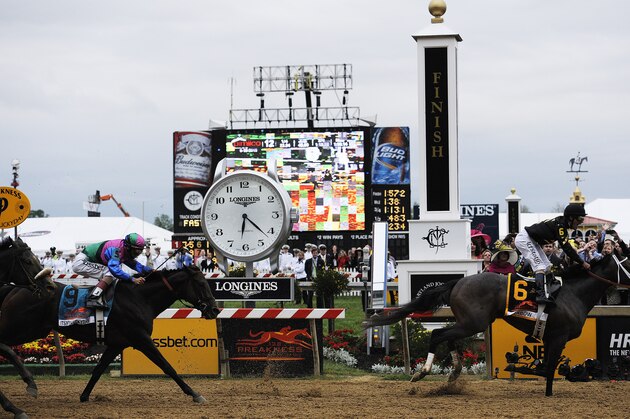 Oxbow, ridden by jockey Gary Stevens, wins the 138th Preakness Stakes horse race at Pimlico Race Course, Saturday, May 18, 2013, in Baltimore. Itsmyluckyday with John Velazquez aboard placers second. (AP Photo/Mike Stewart)