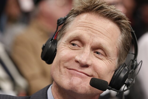 TNT commentator and former Chicago Bulls and San Antonio Spurs guard Steve Kerr broadcasts courtside for Game 4 of an NBA basketball first-round playoff series between the Toronto Raptors and the Brooklyn Nets at the Barclays Center, Sunday, April 27, 2014, in New York.  New York Knicks President Phil Jackson told reporters he interviewed Kerr for the vacant  New York Knicks coaching position. (AP Photo/Kathy Willens)