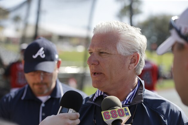 Atlanta Braves Executive Vice President and General Manager Frank Wren meets the media before their spring exhibition baseball game against the Philadelphia Phillies in Kissimmee, Fla., Tuesday, March 11, 2014. (AP Photo/Carlos Osorio)