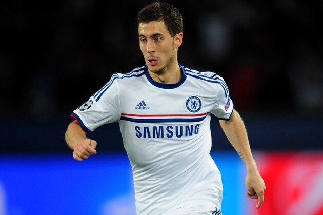 PARIS, FRANCE - APRIL 02:  Eden Hazard of Chelsea runs with the ball during the UEFA Champions League quarter final, first leg match between Paris Saint Germain and Chelsea at Parc des Princes on April 2, 2014 in Paris, France.  (Photo by Shaun Botterill/Getty Images)