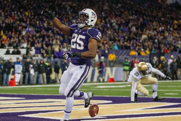 SEATTLE, WA - NOVEMBER 09:  Running back Bishop Sankey #25 of the Washington Huskies celebrates after scoring a touchdown in the first quarter against the Colorado Buffaloes on November 9, 2013 at Husky Stadium in Seattle, Washington. The Huskies defeated the Buffaloes 59-7.  (Photo by Otto Greule Jr/Getty Images)