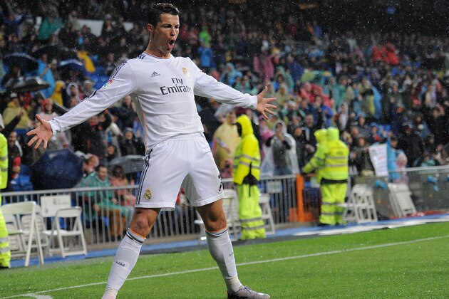 MADRID, SPAIN - MARCH 29:  Cristiano Ronaldo of Real Madrid FC celebrates after scoring his team's opening goal during the La Liga match between Real Madrid CF and Rayo Vallecano de Madrid at Santiago Bernabeu stadium on March 29, 2014 in Madrid, Spain.  (Photo by Denis Doyle/Getty Images)
