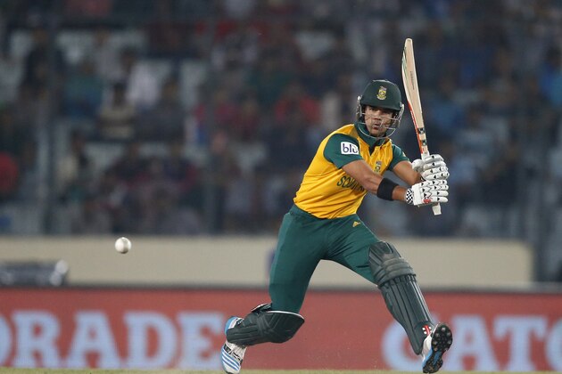 In this Friday, April 4, 2014 photo, South Africa's JP Duminy plays a shot during their ICC Twenty20 Cricket World Cup semi-final match against India in Dhaka, Bangladesh. (AP Photo/Aijaz Rahi)