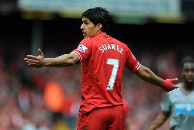 Liverpool's Luis Suarez during their English Premier League soccer match against Newcastle United at Anfield in Liverpool, England, Sunday May 11, 2014. (AP Photo/Clint Hughes)