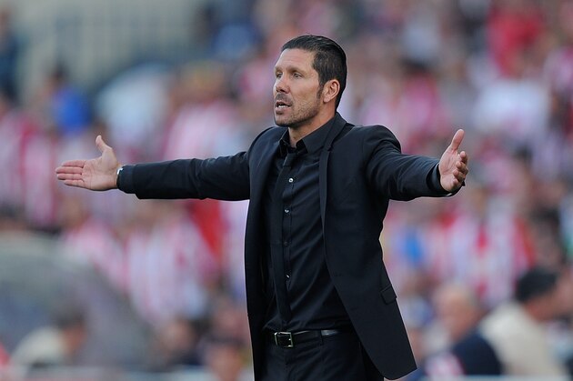 MADRID, SPAIN - MAY 11:  Head coach Diego Simeone of Club Atletico de Madrid reacts during the La Liga match between Club Atletico de Madrid and Malaga CF at Vicente Calderon Stadium on May 11, 2014 in Madrid, Spain.  (Photo by Denis Doyle/Getty Images)