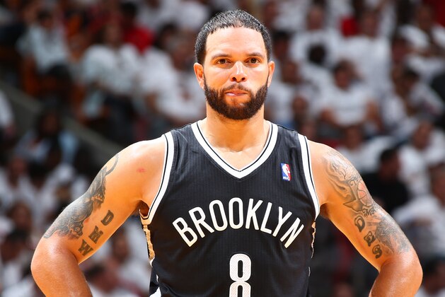 MIAMI, FL - MAY 8: Deron Williams #8 of the Brooklyn Nets looks on against the Miami Heat during Game Two of the Eastern Conference Semifinals of the 2014 NBA playoffs at American Airlines Arena in Miami, Florida on May 8, 2014.  NOTE TO USER: User expressly acknowledges and agrees that, by downloading and or using this photograph, User is consenting to the terms and conditions of the Getty Images License Agreement. Mandatory Copyright Notice: Copyright 2014 NBAE  (Photo by Nathaniel S. Butler/NBAE via Getty Images)