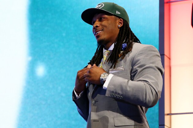 NEW YORK, NY - MAY 08:  Calvin Pryor of the Louisville Cardinals takes the stage after he was picked #18 overall by the New York Jets during the first round of the 2014 NFL Draft at Radio City Music Hall on May 8, 2014 in New York City.  (Photo by Elsa/Getty Images)