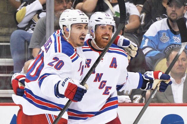 PITTSBURGH, PA - MAY 13:  Chris Kreider #20 of the New York Rangers and Brad Richards #19 of the New York Rangers celebrate Richards' second period goal against the Pittsburgh Penguins in Game Seven of the Second Round of the 2014 NHL Stanley Cup Playoffs on May 13, 2014 at CONSOL Energy Center in Pittsburgh, Pennsylvania. New York defeated Pittsburgh 2-1 to advance to the next round.  (Photo by Jamie Sabau/Getty Images)