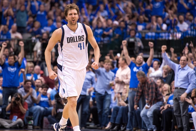 May 2, 2014; Dallas, TX, USA; Dallas Mavericks forward Dirk Nowitzki (41) celebrates during the first half against the San Antonio Spurs in game six of the first round of the 2014 NBA Playoffs at American Airlines Center. Mandatory Credit: Jerome Miron-USA TODAY Sports