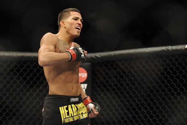 Jan 26, 2013; Chicago, IL, USA;  Anthony Pettis celebrates after defeating Donald Cerrone (not pictured) during UFC on FOX 6 at the United Center.  Mandatory Credit: David Banks-USA TODAY Sports