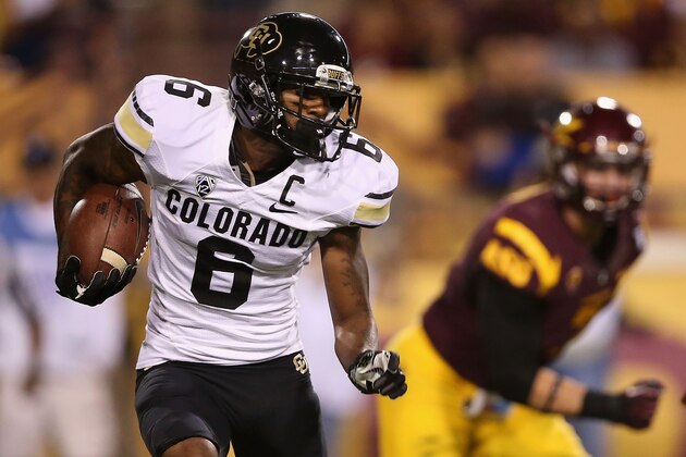TEMPE, AZ - OCTOBER 12:  Wide receiver Paul Richardson #6 of the Colorado Buffaloes runs with the football after a reception during the college football game against the Arizona State Sun Devils at Sun Devil Stadium on October 12, 2013 in Tempe, Arizona. The Sun Devils defeated the Buffaloes 54-13.  (Photo by Christian Petersen/Getty Images)