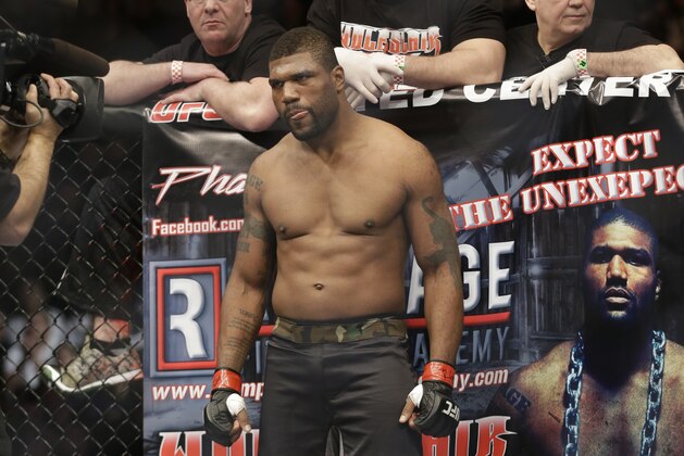 Quinton Jackson stands on the ring before fighting wit Glover Teixeira during UFC Light Heavyweight Championship on FOX 6 at the United Center in Chicago, Saturday, Jan. 26, 2013. Teixeira won the bout. (AP Photo/Nam Y. Huh)