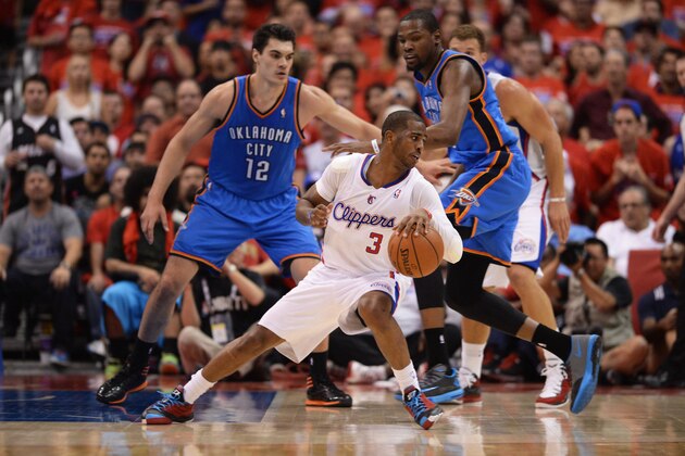 LOS ANGELES, CA - MAY 15: Chris Paul #3 of the Los Angeles Clippers handles the ball against the Oklahoma City Thunder in Game Six of the Western Conference Semifinals during the 2014 NBA Playoffs at Staples Center on May 15, 2014 in Los Angeles, California. NOTE TO USER: User expressly acknowledges and agrees that, by downloading and/or using this Photograph, user is consenting to the terms and conditions of the Getty Images License Agreement. Mandatory Copyright Notice: Copyright 2014 NBAE (Photo by Noah Graham/NBAE via Getty Images)