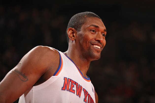 NEW YORK, NY - NOVEMBER 14:  Metta World Peace #51 of the New York Knicks smiles during the game against the Houston Rockets during a game at Madison Square Garden in New York City on November 14, 2013.  NOTE TO USER: User expressly acknowledges and agrees that, by downloading and or using this photograph, User is consenting to the terms and conditions of the Getty Images License Agreement. Mandatory Copyright Notice: Copyright 2013 NBAE  (Photo by Nathaniel S. Butler/NBAE via Getty Images)