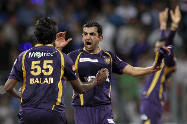 Kolkata Knight Riders' Gautam Gambhir, right,  and L. Balaji celebrates after their team won the match against Mumbai Indians during the Indian Premier League (IPL) cricket match in Mumbai, India, Wednesday, May 16, 2012. (AP Photo/ Rajanish Kakade)