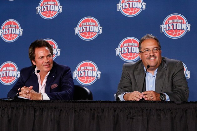 AUBURN HILLS, MI - MAY 15: Detroit Pistons owner Tom Gores (L) talks with new head coach and President of Basketball Operations Stan Van Gundy during a press conference to introduce Van Gundy at the Palace of Auburn Hills on May 15, 2014 in Auburn Hills, Michigan. NOTE TO USER: User expressly acknowledges and agrees that, by downloading and or using this photograph, User is consenting to the terms and conditions of the Getty Images License Agreement.  (Photo by Gregory Shamus/Getty Images)