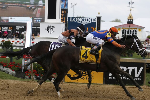Stopchargingmaria with Javier Castellano atop wins the Black-Eyed Susan Stakes horse race as Vero Amore with Frank Pennington riding places at Pimlico Race Course, Friday, May 16, 2014, in Baltimore. The 139th Preakness horse race takes place Saturday. (AP Photo/Mike Stewart)