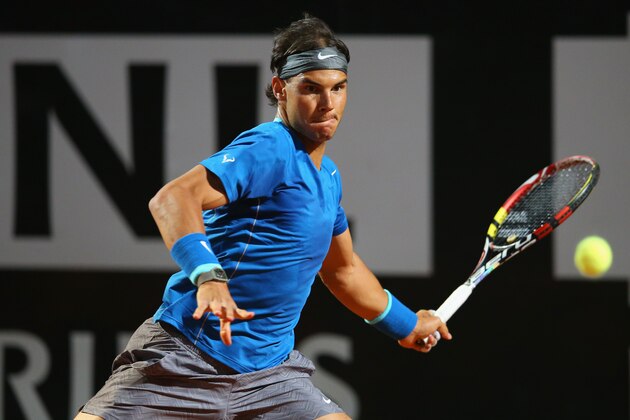 ROME, ITALY - MAY 16:  Rafael Nadal of Spain in action in his match against Andy Murray of Great Britain during day six of the Internazionali BNL d'Italia tennis 2014 on May 16, 2014 in Rome, Italy.  (Photo by Julian Finney/Getty Images)