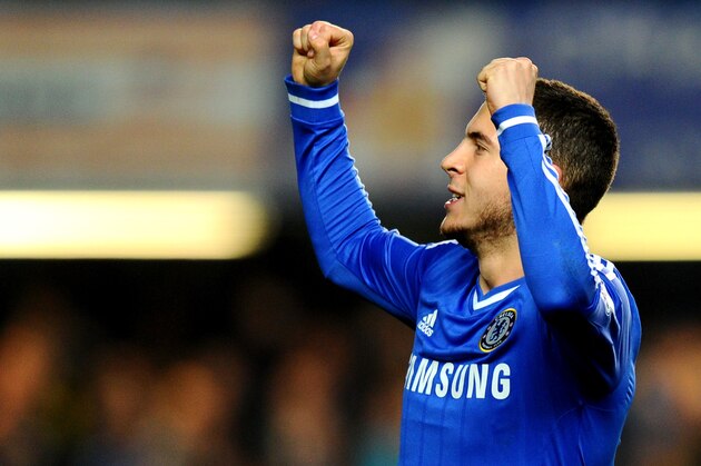 LONDON, ENGLAND - MARCH 08:  Eden Hazard of Chelsea celebrates after scoring his team's second goal from the penalty spot during the Barclays Premier League match between Chelsea and Tottenham Hotspur at Stamford Bridge on March 8, 2014 in London, England.  (Photo by Mike Hewitt/Getty Images)