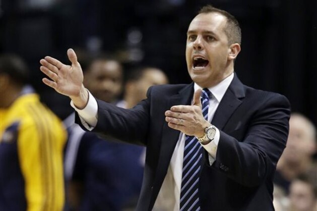 Indiana Pacers head coach Frank Vogel shouts instructions during the second half of game 2 of the Eastern Conference semifinal NBA basketball playoff series against the Washington Wizards, Wednesday, May 7, 2014, in Indianapolis. Indiana won 86-82. (AP Photo/Darron Cummings)