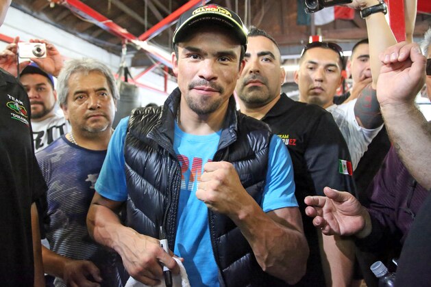 Juan Manuel Marquez, of Mexico, poses in the ring during a media workout at a boxing club in Bell, Calif., Wednesday, May 14, 2014. He and Mike Alvarado are preparing for their WBO welterweight title elimination bout at the Forum in Inglewood, Calif., Saturday. The winner will become the mandatory challenger to WBO welterweight champion Manny Pacquiao. (AP Photo/Nick Ut)