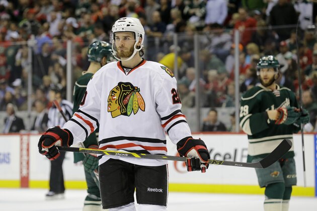 Chicago Blackhawks left wing Brandon Saad (20) gets into position for a face-off during the second period of Game 6 of an NHL hockey second-round playoff series against the Minnesota Wild in St. Paul, Minn., Tuesday, May 13, 2014. (AP Photo/Ann Heisenfelt)