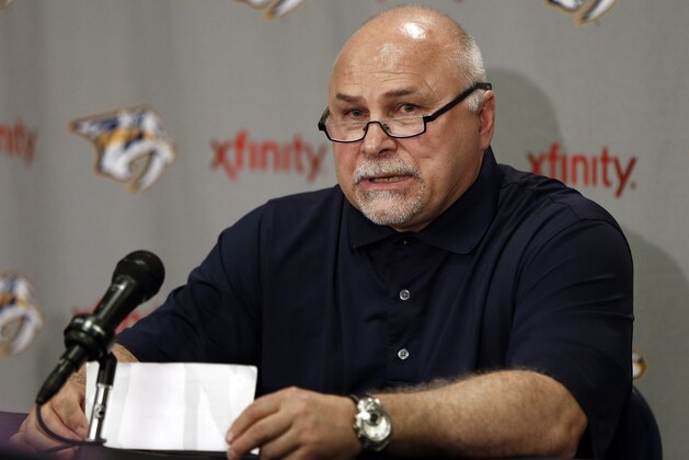 Nashville Predators head coach Barry Trotz answers questions at a news conference Monday, April 14, 2014, in Nashville, Tenn. The Predators announced earlier in the day that Trotz's contract won't be extended and they will begin looking for a new head coach. Trotz is the only head coach the NHL hockey team has had. (AP Photo/Mark Humphrey)