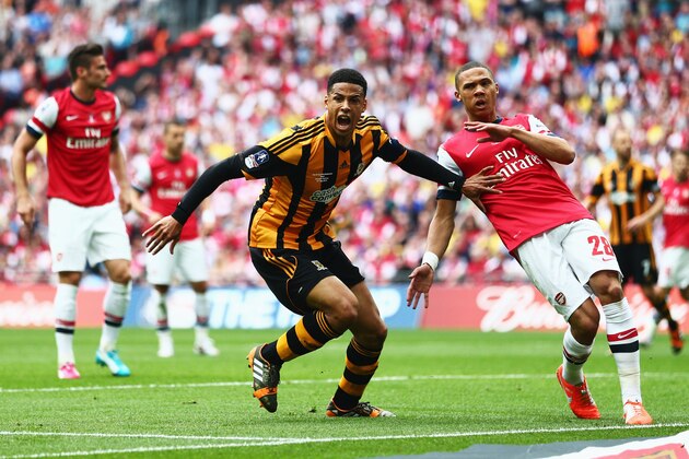LONDON, ENGLAND - MAY 17:  Curtis Davies of Hull City celebrates as he scores their second goal during the FA Cup with Budweiser Final match between Arsenal and Hull City at Wembley Stadium on May 17, 2014 in London, England.  (Photo by Clive Mason/Getty Images)