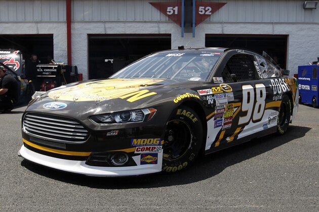 Driver Josh Wise pulls out of the garage during practice for Sunday's Aaron's 499 NASCAR auto race at Talladega Superspeedway on Friday, May 2, 2014, in Talladega, Ala. (AP Images Photo/Butch Dill)