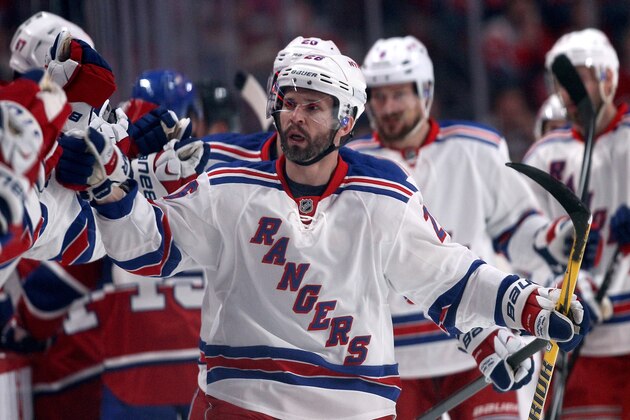 MONTREAL, QC - MAY 17: Martin St. Louis #26 of the New York Rangers celebrates with teammates after scoring a first period goal against the Montreal Canadiens in Game One of the Eastern Conference Finals of the 2014 NHL Stanley Cup Playoffs at the Bell Centre on May 17, 2014 in Montreal, Canada. (Photo by Bruce Bennett/Getty Images) MONTREAL, QC - MAY 17: Martin St. Louis #26 of the New York Rangers celebrates with teammates after scoring a first period goal against the Montreal Canadiens in Game One of the Eastern Conference Finals of the 2014 NHL Stanley Cup Playoffs at the Bell Centre on May 17, 2014 in Montreal, Canada. (Photo by Bruce Bennett/Getty Images)