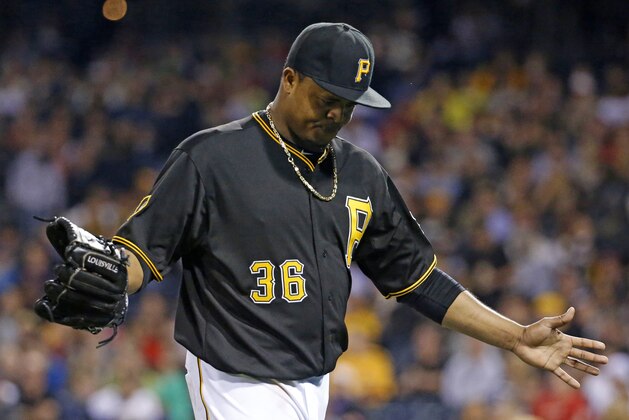Pittsburgh Pirates starting pitcher Edinson Volquez (36) walks to the dugout after being pulled in the fifth inning of a baseball game against the St. Louis Cardinals in Pittsburgh Saturday, May 10, 2014. The Pirates won 4-3. (AP Photo/Gene J. Puskar)