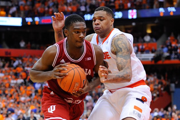 SYRACUSE, NY - DECEMBER 03:  Noah Vonleh #1 of the Indiana Hoosiers drives to the basket around the defense of DaJuan Coleman #32 of the Syracuse Orange during the second half at the Carrier Dome on December 3, 2013 in Syracuse, New York.  Syracuse defeated Indiana 69-52.  (Photo by Rich Barnes/Getty Images)