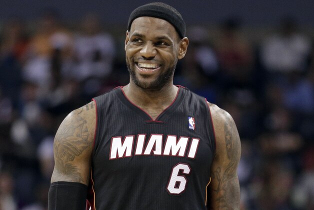 Miami Heat's LeBron James as he walks down the court during the second half in Game 4 of an opening-round NBA basketball playoff series against the Charlotte Bobcats in Charlotte, N.C., Monday, April 28, 2014. The Heat won 109-98, sweeping the series. (AP Photo/Chuck Burton)