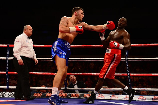 CARDIFF, WALES - MAY 17:  Nathan Cleverly (L) in action against Shaun Corbin during their WBA Inter-Continental Cruiserweight Title bout at the Motorpoint Arena on May 17, 2014 in Cardiff, Wales.  (Photo by Dan Mullan/Getty Images)