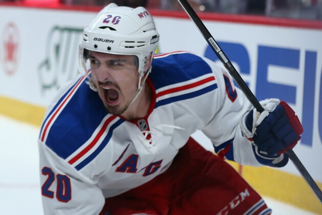 MONTREAL, QC - MAY 17:  Chris Kreider #20 of the New York Rangers celebrates after scoring a second period goal against the Montreal Canadiens in Game One of the Eastern Conference Finals of the 2014 NHL Stanley Cup Playoffs at the Bell Centre on May 17, 2014 in Montreal, Canada. The Rangers defeated the Canadiens 7-2.  (Photo by Bruce Bennett/Getty Images)