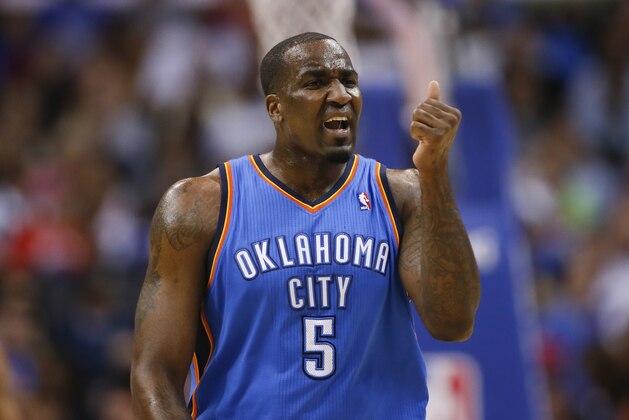 Oklahoma City Thunder center Kendrick Perkins shoes his thumb against the Los Angeles Clippers during the first half of an NBA basketball game in Los Angeles, Wednesday, April 9, 2014. (AP Photo/Danny Moloshok)
