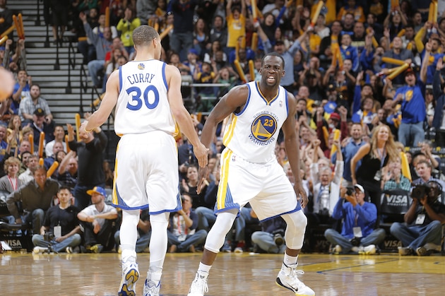 OAKLAND, CA - MARCH 9: Stephen Curry #30 and Draymond Green #23 of the Golden State Warriors celebrate while facing the Phoenix Suns on March 9, 2014 at Oracle Arena in Oakland, California. NOTE TO USER: User expressly acknowledges and agrees that, by downloading and or using this photograph, user is consenting to the terms and conditions of Getty Images License Agreement. Mandatory Copyright Notice: Copyright 2014 NBAE (Photo by Rocky Widner/NBAE via Getty Images)